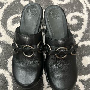 Black leather Nurture clogs